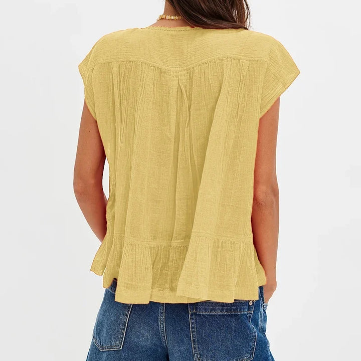 Kiana | Women's Ruffle Hem Sleeveless Blouse-Omni Prime Goods