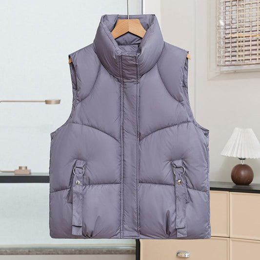 Gewatteerde doorgestikte bodywarmer voor dames met opstaande kraag en opgestikte zakken