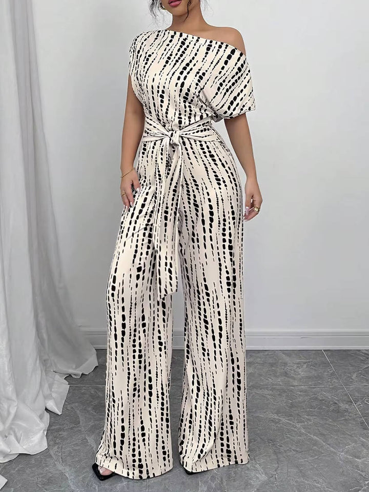 Women's Asymmetric One Shoulder Patterned Jumpsuit with Tie Waist